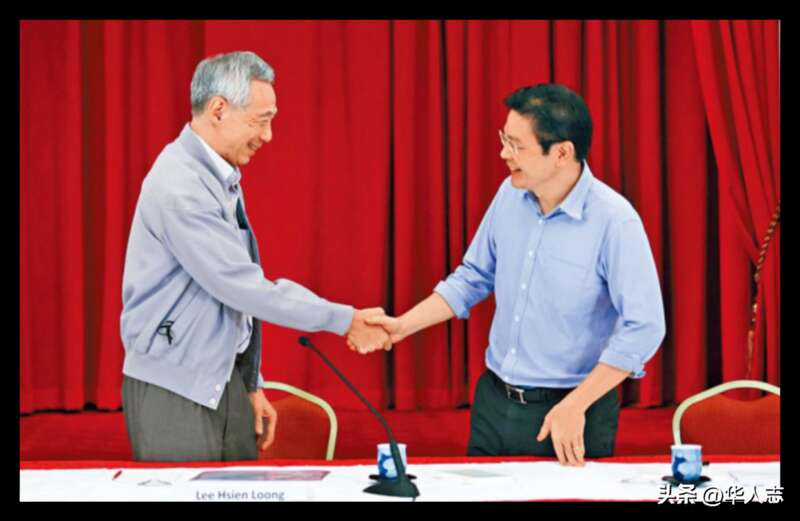 李显龙交班